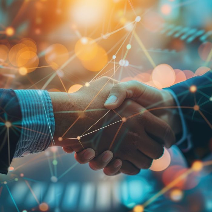 Two people shaking hands with digital network overlay Two people shaking hands with digital network overlay