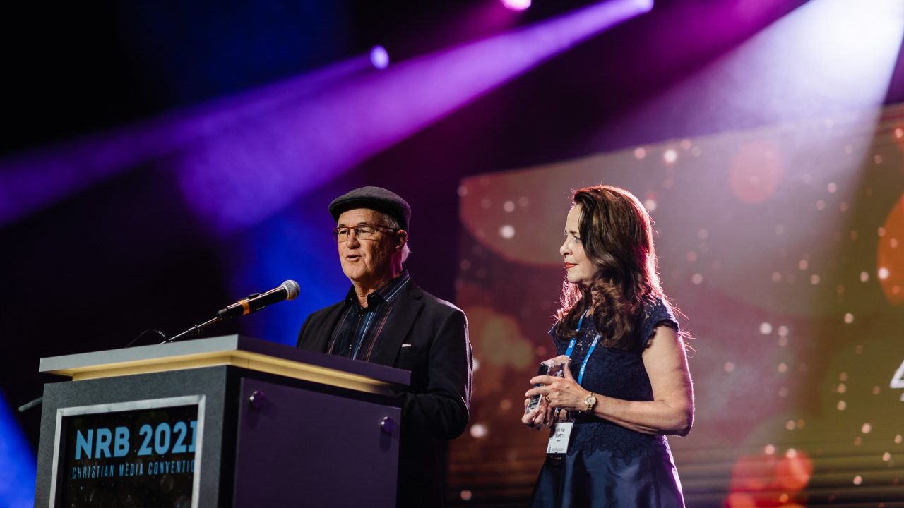 Rick Eldridge and Marci Henna accepting their awards for WHEN WE LAST SPOKE at the ICVM Awards.